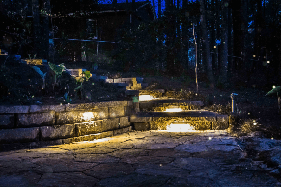 Hardscape with outdoor lighting at nigh