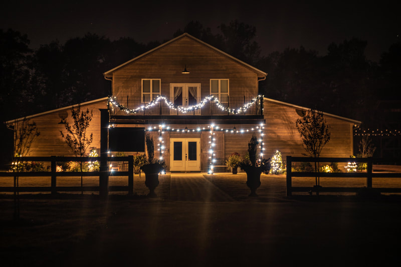 Barn with holiday lighting